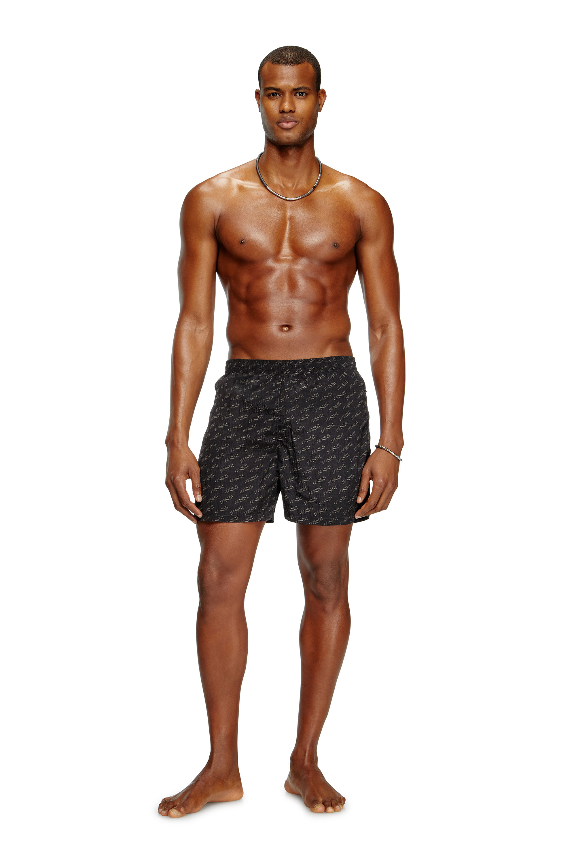 Diesel - DANIEL-41-MONO-UTLT, Short de bain mi-long avec logo en all-over Homme in Noir - 1